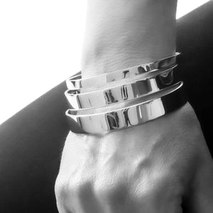 three sterling silver bangles