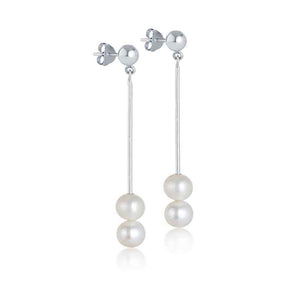 Elegant double pearl drop earrings with two white pearls dangling from a slim silver rod, secured by a stud backing. Perfect for adding a touch of sophistication to any outfit.