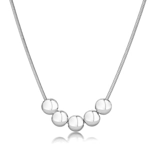 Elegant Small 5 Ball Necklace inspired by the ancient abacus, featuring five movable balls on a delicate silver snake chain, ideal for lightweight, versatile, and chic everyday wear.