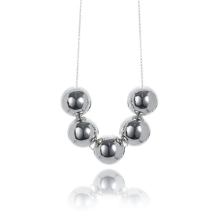A stunning statement necklace that features 5 large sterling silver balls