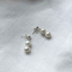 drop earrings with two white  pearls and a sterling silver ball stud