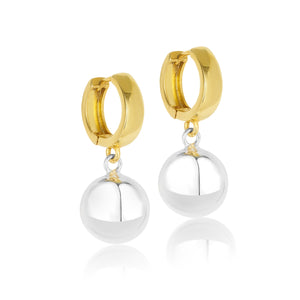 24k gold vermeil huggie earrrings with a ball attached at the base of the hoop