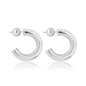 High-polished sterling silver SOPHIE ANNA tube hoop earrings with ball fastening showcased on a white background.